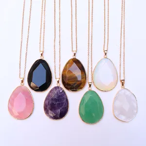 Set of 7 faceted teardrop gemstone necklaces with natural crystals and gold plated chains
