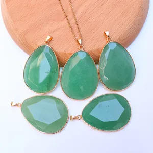 Faceted green aventurine teardrop pendants set with gold plated edging and thin chain