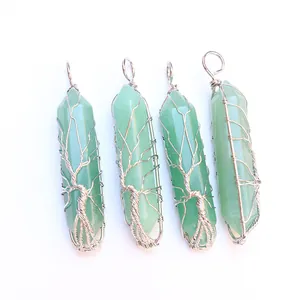 Detail showing four green aventurine hexagonal crystal pendants with tree of life wire wrap