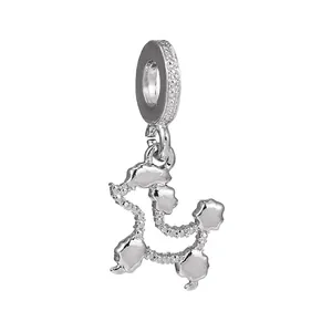 Charm constellation en argent avec micro-pavage de zircons et motif abstrait d'étoiles filantes