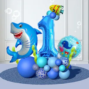 Detail of shark foil balloon column with blue number one for first birthday party