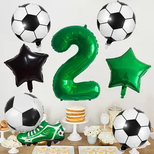 Detail of soccer theme party kit with green number 2 balloon and soccer shoe foil balloon