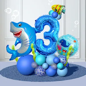 Detail of shark and number 3 balloon column for ocean-themed 3rd birthday party decoration