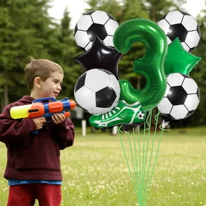 Soccer theme balloon set with green number 3, cleats and footballs for birthday party