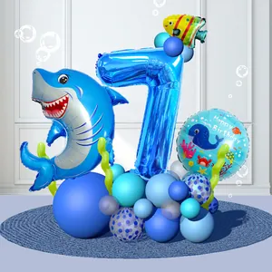 Detail of 7th birthday ocean theme balloon set with shark and blue number 7 foil balloon