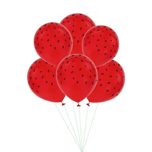 Detailed view of six red watermelon latex balloons with black seed prints for parties