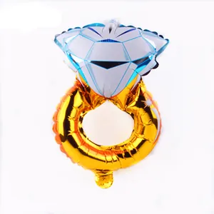 Detailed view of a diamond ring shaped foil balloon for weddings and proposal parties