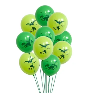 Close-up of green dinosaur latex balloons with silhouettes for jurassic party decor