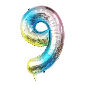 Detailed view of the gradient rainbow number 9 foil balloon for birthday party decoration