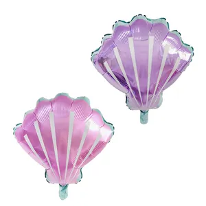 Seashell foil balloons in purple and pink for mermaid themed birthday party decoration