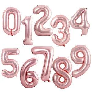Collection of rose gold number foil balloons from 0 to 9 for birthday party decorations