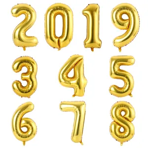 Macro shot of 40-inch glossy gold number 0-9 foil balloons set for birthday decorations