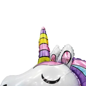 Rainbow unicorn head foil balloon with colorful mane and spiral horn for birthday party