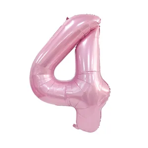 Detailed view of number 4 pink foil balloon with a shiny metallic finish for birthdays