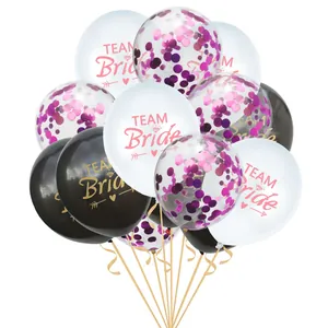 Detail of Team Bride balloons set with rose gold confetti and elegant printed graphics