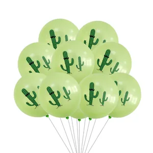 Green latex balloons with cactus prints and white ribbons for party decorations