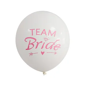 Detail of white Team Bride latex balloon with pink diamond and heart printing