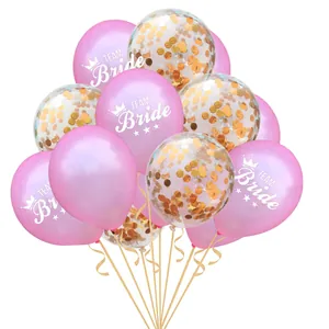 Detail of Team Bride pink balloons and gold confetti balloons for party decor