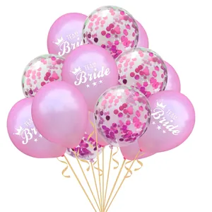 Detail of pink Team Bride balloons with crowns and transparent sequins for bachelorette parties
