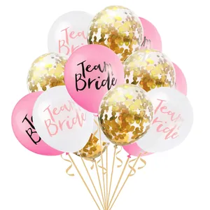 Detail of rose gold Team Bride confetti balloons for bachelorette wedding party decorations