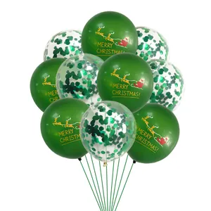 Detail of green Merry Christmas latex balloons and transparent confetti-filled balloons