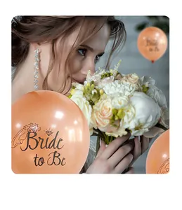 Close-up of 12-inch rose gold Bride to Be latex balloon with diamond ring graphic