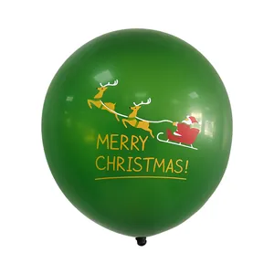 Detail of green latex balloon with Santa Claus sleigh design and Merry Christmas text