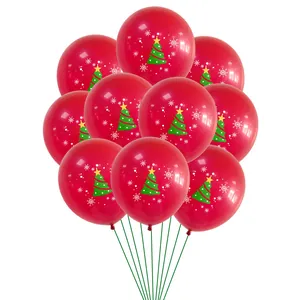Red Christmas latex balloons with festive green tree and white snowflake patterns