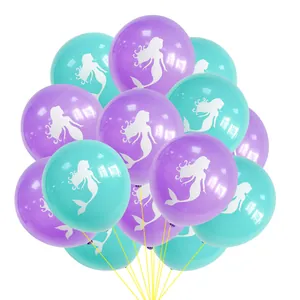 Detail of purple and teal latex balloons featuring white mermaid silhouettes for parties