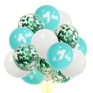 Detail of mermaid balloons set with sequins and ocean theme silhouettes for party decor