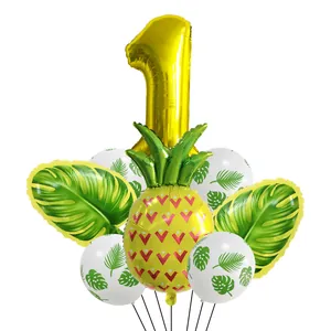 Set fête Hawaii avec ballon chiffre 1 doré, ananas et feuilles de palmier