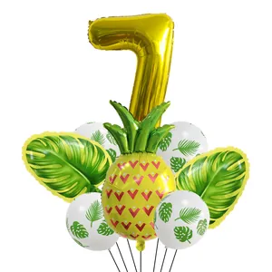 Kit 7ème anniversaire tropical avec ananas, feuilles de palmier et ballon chiffre doré