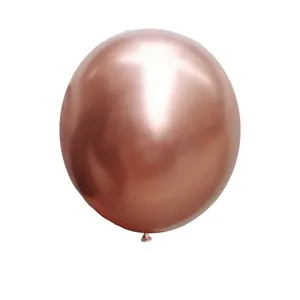 Close-up of a metallic rose gold latex balloon with a highly reflective mirror finish