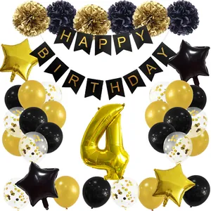 Detail of black and gold birthday party set with number 4 balloon and paper flowers