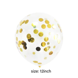 Macro view of a 12-inch clear balloon filled with shiny gold round sequins for parties