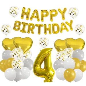 Detail of 4th birthday gold foil balloons set with heart shapes and latex balloons
