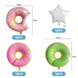 Detailed set of donut foil balloons in various sizes and colors for birthday party decor