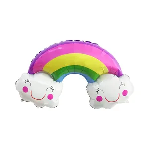Close-up of rainbow cloud foil balloon with cute smiley face for party decorations
