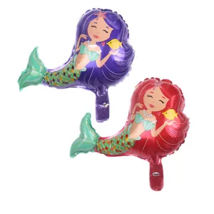 Detailed macro view of 16-inch mermaid foil balloons with shiny purple and red fish scale textures