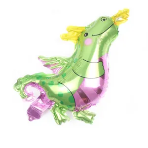 Detail of dragon shaped foil balloon with shiny metallic texture for party decoration