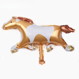 Close-up of golden horse-shaped foil balloon with brown mane and white accents