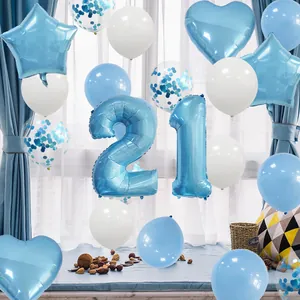 Detail of blue and white latex party balloons with silver star and heart foil accents