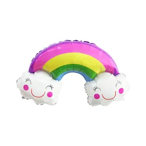 Detailed view of rainbow foil balloon with colorful stripes and smiling clouds for party