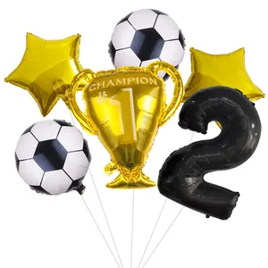 Detail of soccer theme balloon set with gold trophy, stars, and black number 2 balloon