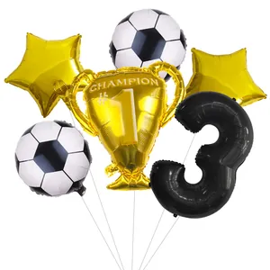 Detail of soccer theme balloon set with gold champion trophy and black number 3 balloon