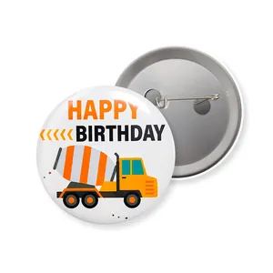 Detailed front and back view of tinplate birthday badge with cartoon cement truck pattern