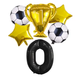 Detail view of soccer champion balloon set featuring trophy and number 0 foil balloons