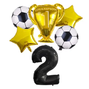 Detail of football balloon set with black number 2, golden trophy and star balloons