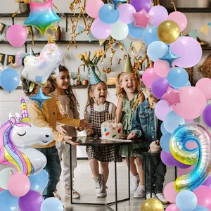 Unicorn birthday party balloon kit with number 9 and colorful macarons for 9th girls party