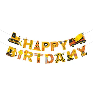 Close-up of Happy Birthday banner featuring construction vehicle elements like excavators